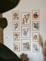 Décoration murale avec ses affiches aquarelles sur le thème de la savane : lion, éléphant, panda, girafe, zèbre, koala, tigre, léopard