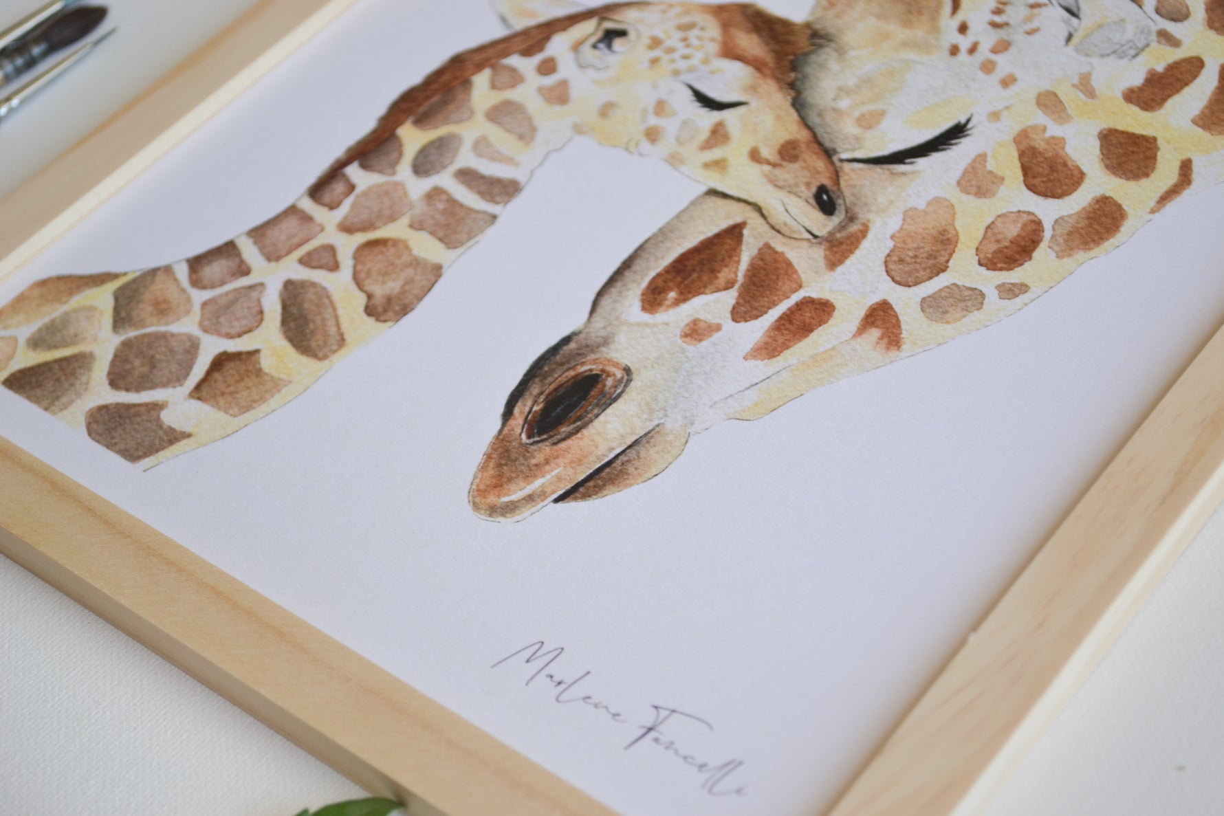 llustration aquarelle d’une maman girafe et son girafon